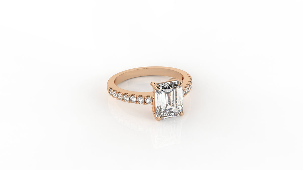 Rose gold ring with a central emerald-cut diamond GLAM NYC