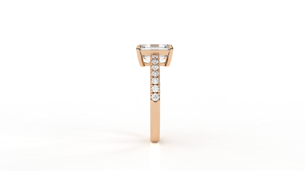 Rose gold ring with a central emerald-cut diamond GLAM NYC