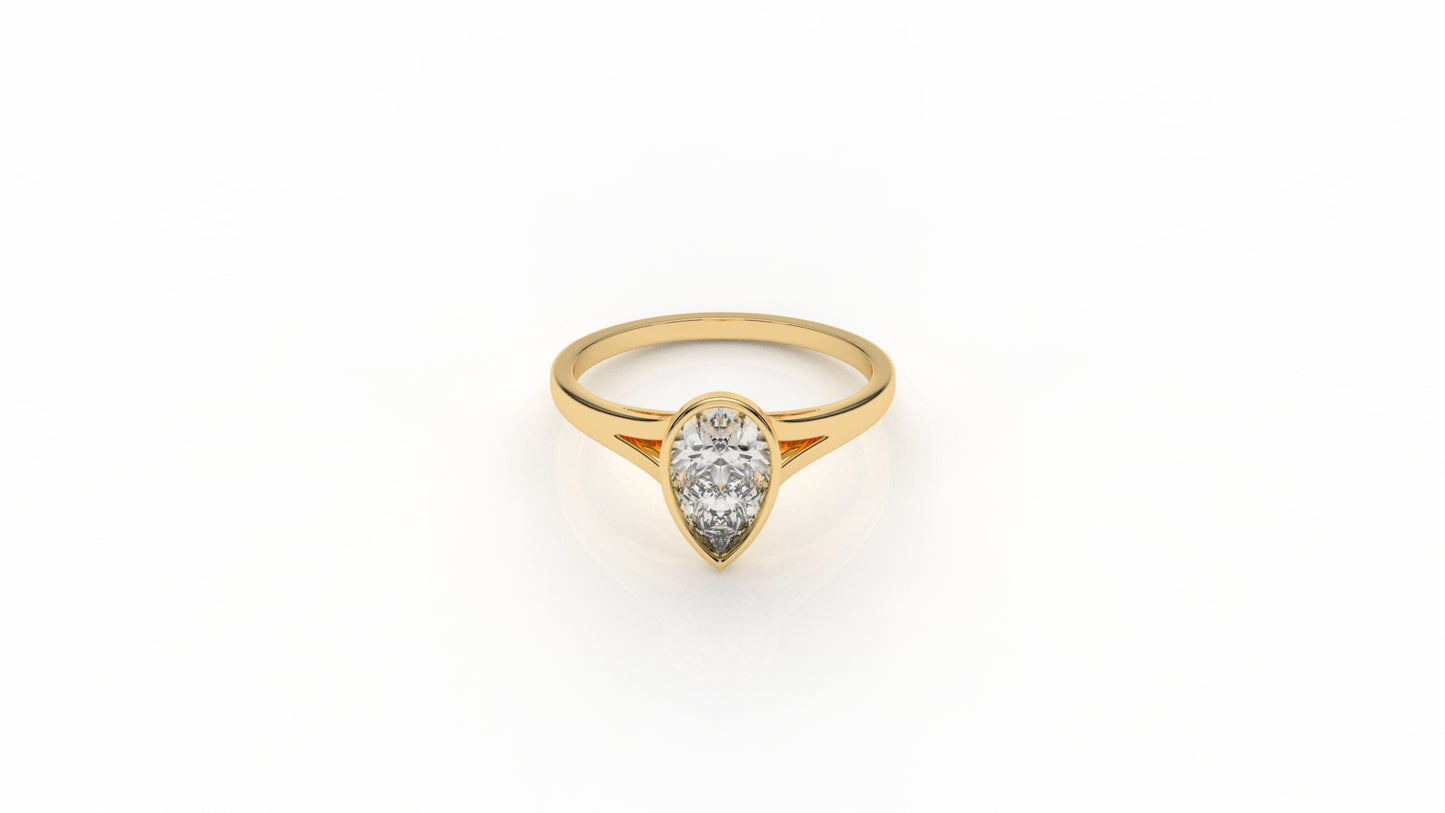Gold ring with a pear-shaped diamond GLAM NYC