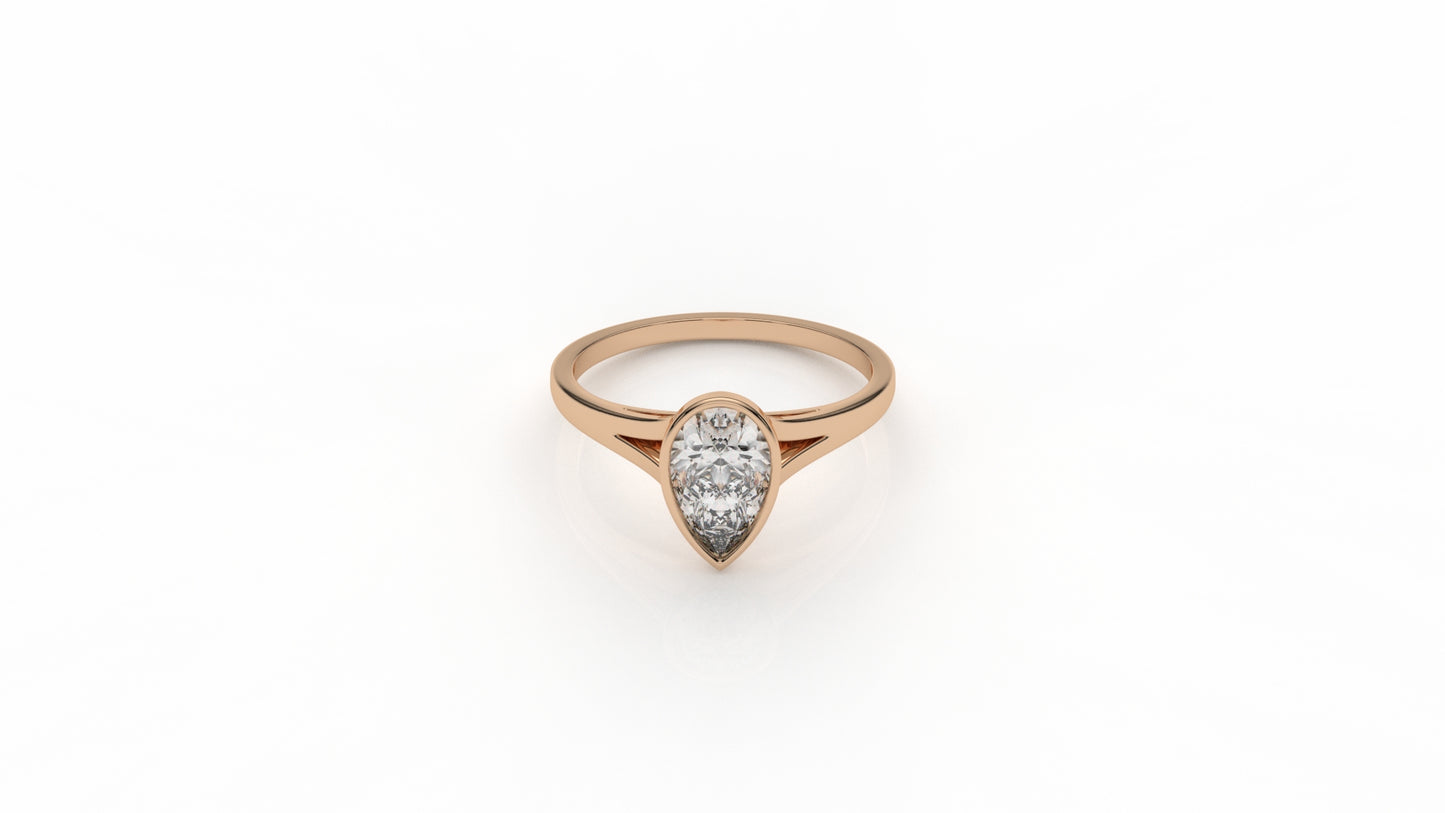 Rose gold ring with a pear-shaped diamond GLAM NYC
