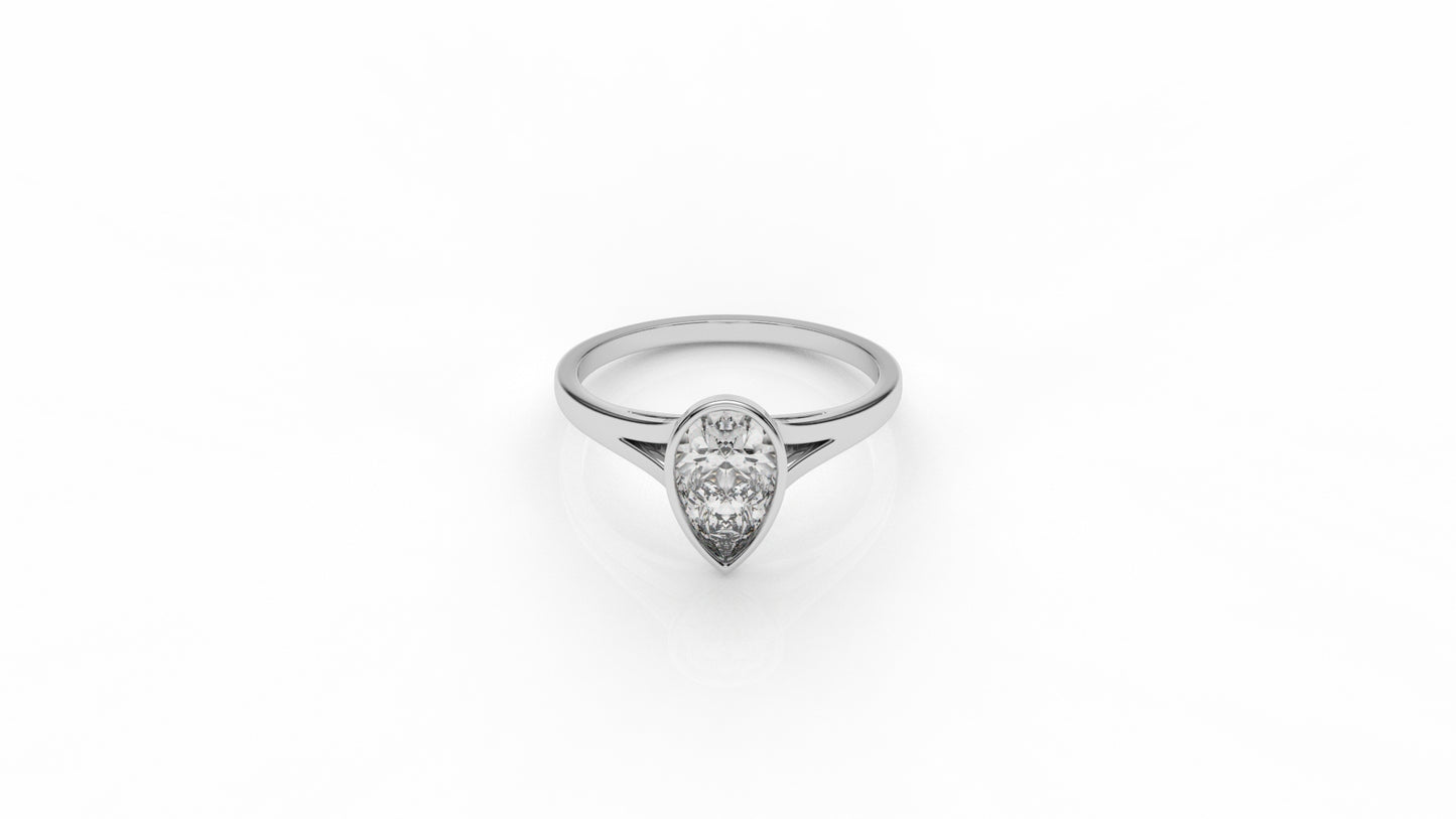 Silver ring with a pear-shaped diamond GLAM NYC