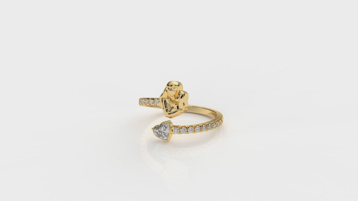 Gold ring with mother holding her daughter and with a diamond heart design GLAM NYC