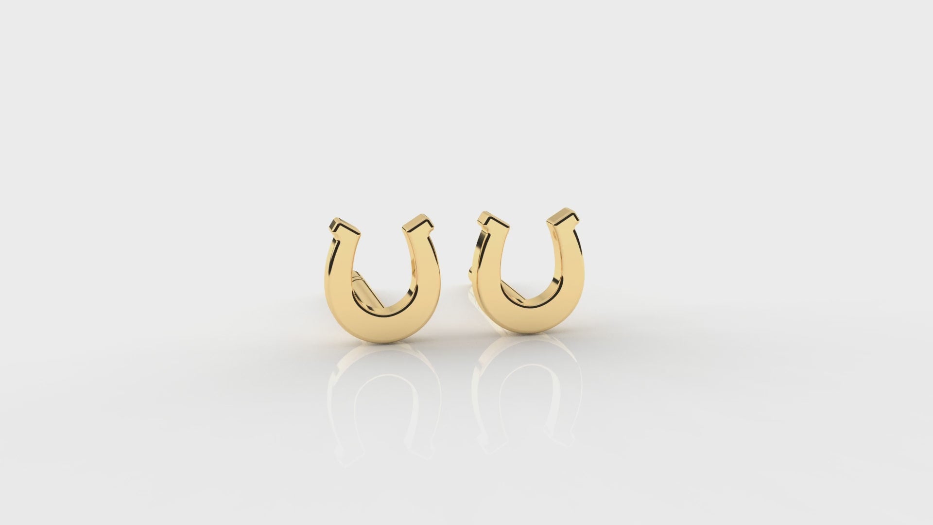 Gold horseshoe-shaped earrings GLAM NYC